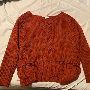 Oversized brick color knitted sweater